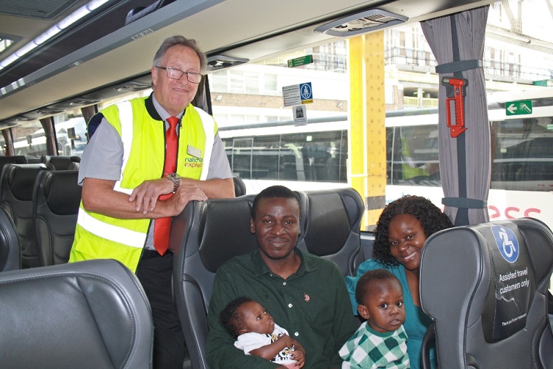 Coach driver with family onboard a coach